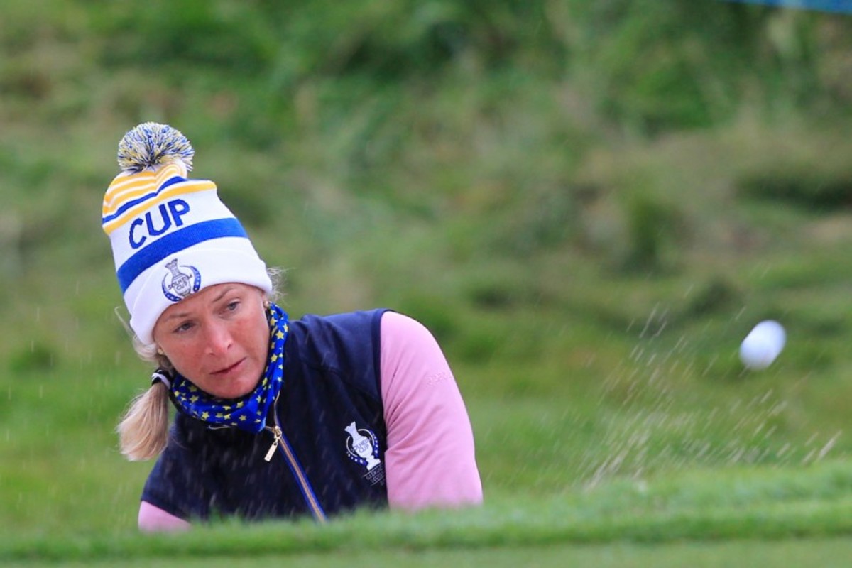 Suzann Pettersen goes out in style by posting the clinching point for Europe in the Solheim Cup. 