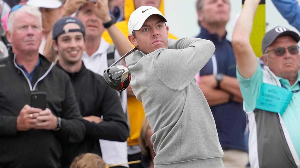 Rory McIlroy watches a tee shot at the 2022 British Open.