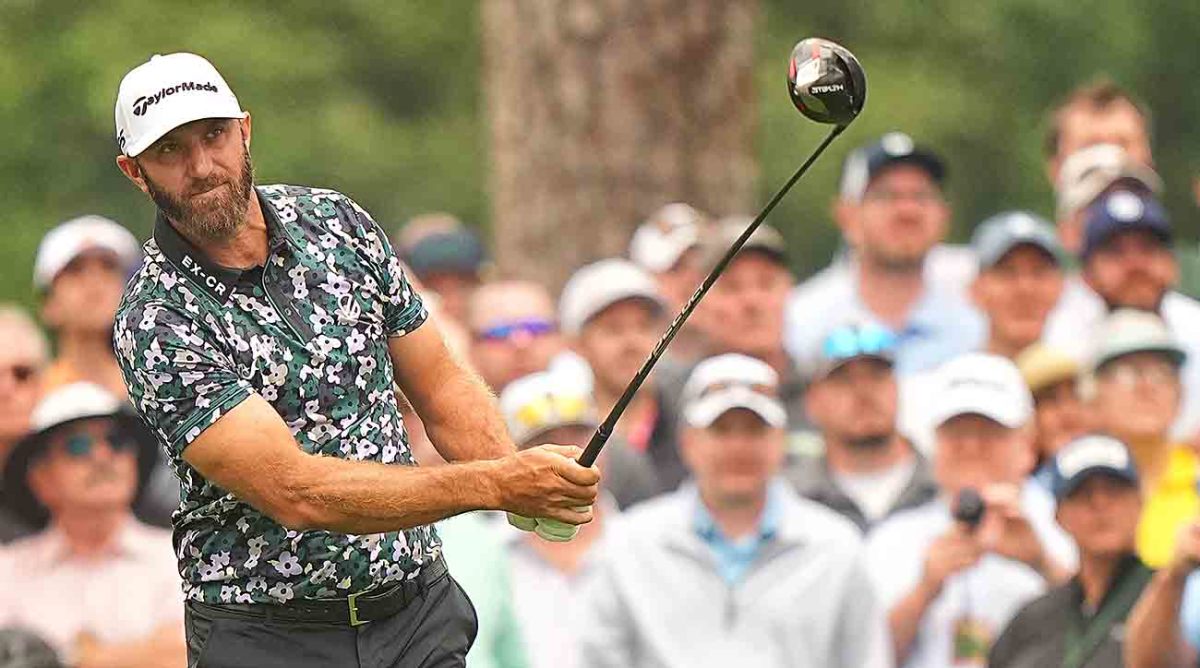 Dustin Johnson watches a drive during practice at the 2023 Masters.