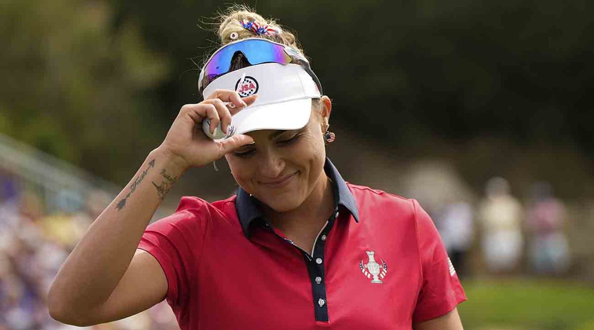 Solheim Cup team U.S. golfer Lexi Thompson prepares to hit her tee shot on the first hole during the fourball play at the 2023 Solheim Cup in Finca Cortesin, near Casares, southern Spain.