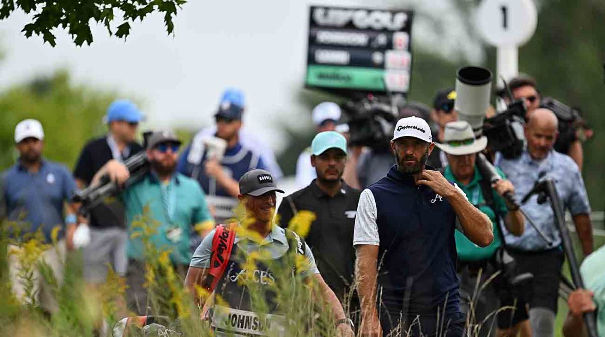 Dustin Johnson walks up to the second tee during the final round of the 2023 LIV Golf Chicago golf tournament at Rich Harvest Farms.