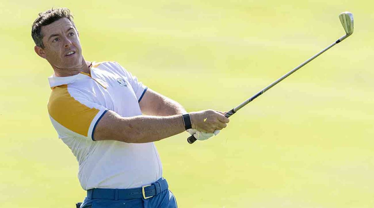 Team Europe golfer Rory McIlroy hits his shot from the rough on the second fairway during a practice round for 2023 Ryder Cup in Rome.