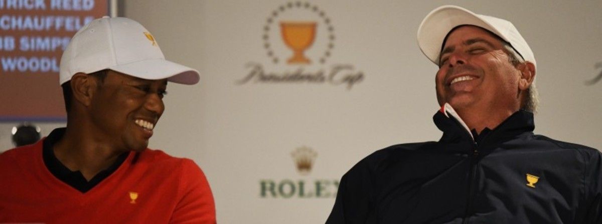 U.S. captain Tiger Woods and assistant Fred Couples share a laugh during the media session announcing the Presidents Cup pairings.