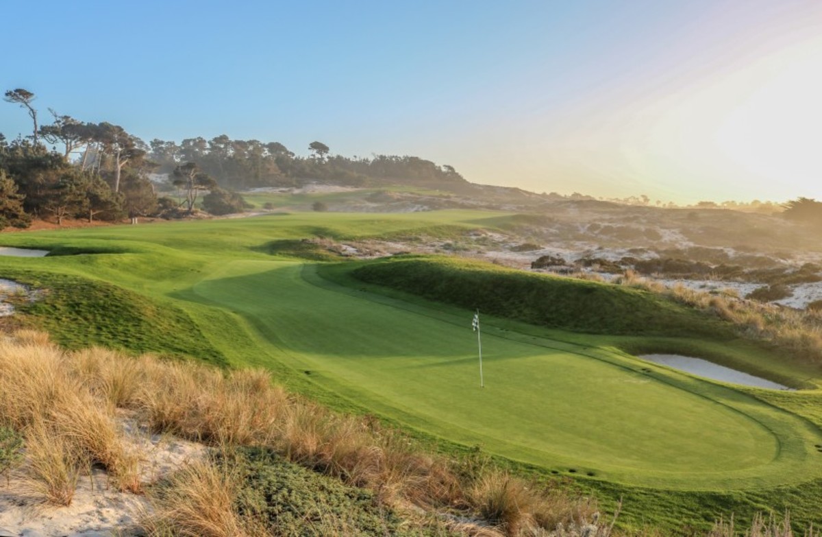 Spyglass Hill Golf Course's par-4 fourth hole is equal parts beauty and brute. The Pacific Ocean frames the left side of the potentially drivable hole, though the green is tucked in between the dunes.