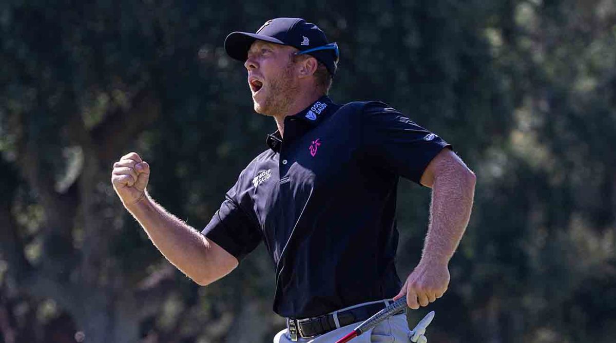 Talor Gooch pumps his fist after winning the 2023 LIV Golf event in Spain.