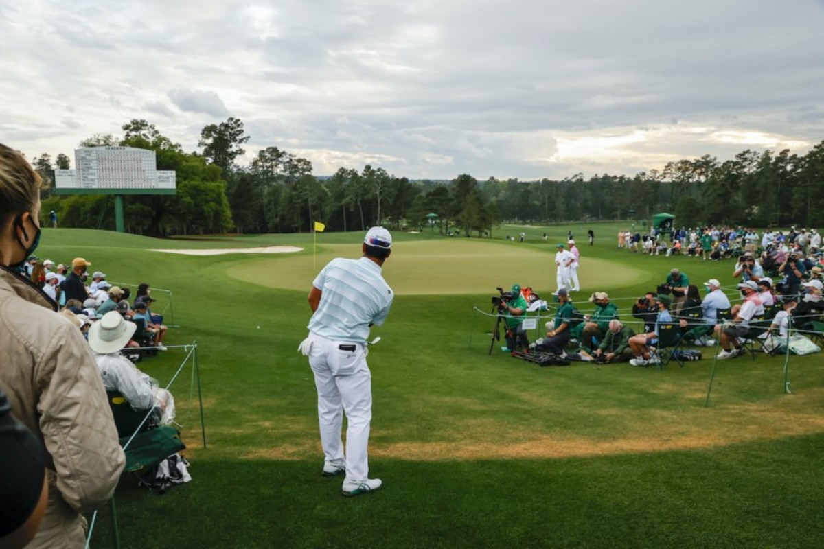 Hideki Matsuyama pitches from far behind the 18th green at Augusta National, saving par with a nifty bump-and-run to cap a 6-under 30 back side and a bogey-free 65.