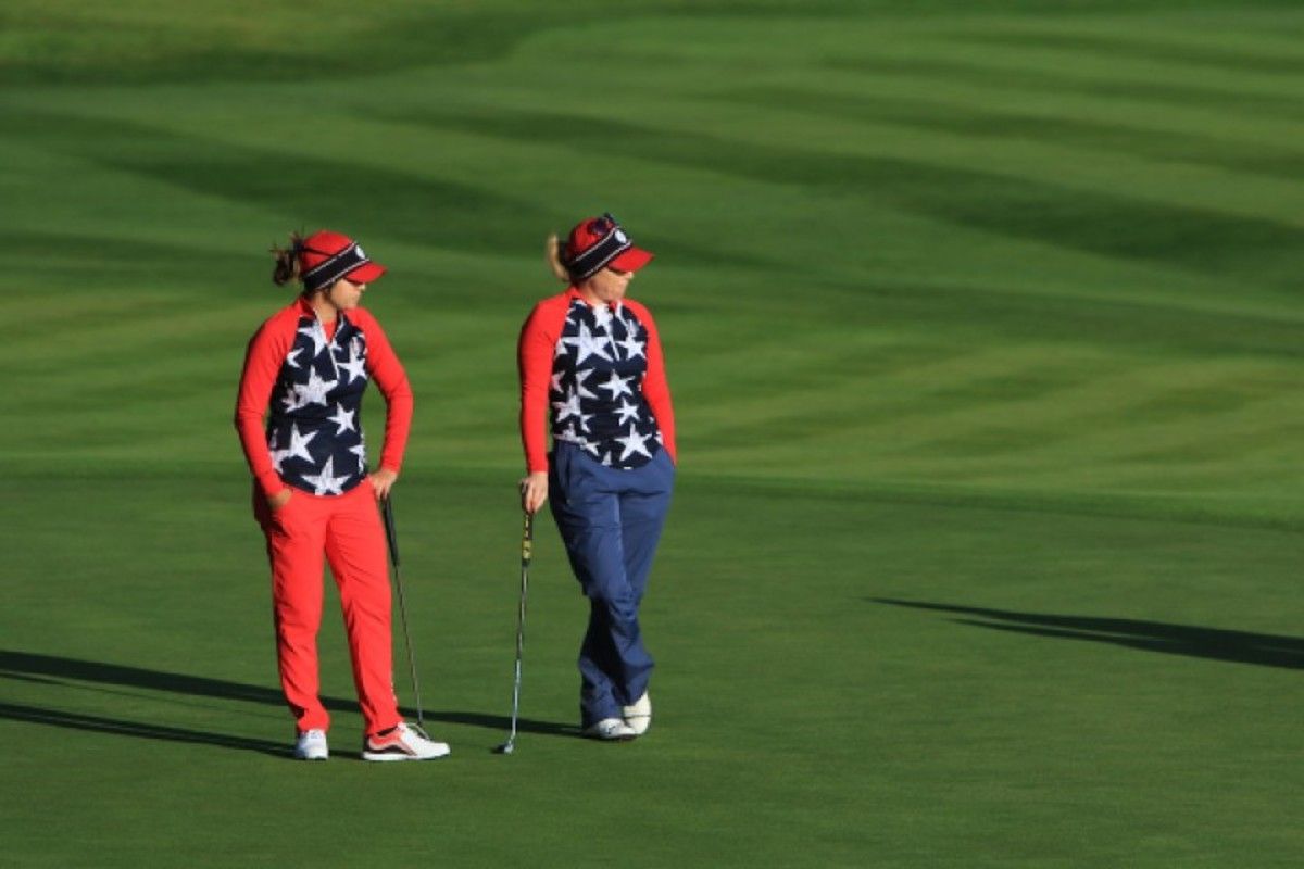 Americans Marina Alex (left) and Day 1 foursomes partner Morgan Pressel strike a familiar pose during the Solheim Cup.