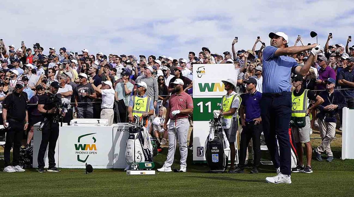 Scottie Scheffler tees off in the final round of the WM Phoenix Open.