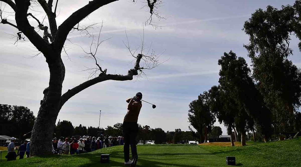 Adam Scott tees off in the first round of the 2023 Genesis Invitational.