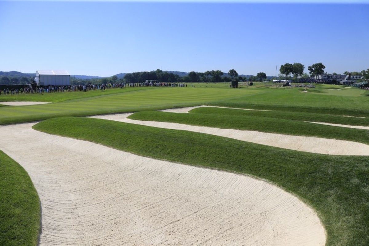 Golfers at the 15th hole at Oakmont (Pa.) Country Club, site of the 2016 U.S. Open, must negotiate a wicked bunker complex, but tree trouble is the least of their worries. Nearly 15,000 trees have been removed at Oakmont.