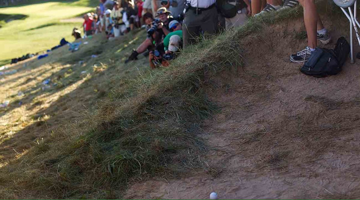 A view of the golf ball of Dustin Johnson in the bunker on the 18th hole during the final round of the 2010 PGA Championship at Whistling Straits. Johnson grounded his club and was penalized two strokes eliminating him from a tiebreaker playoff.