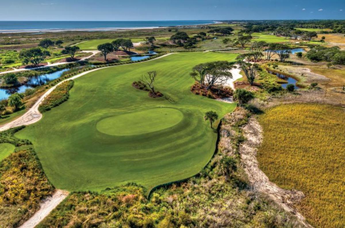 The par-4 third hole starts with a tee shot from an isolated teeing ground over the marsh to a generous fairway. The approach is the tricky shot as it's into a green that sits atop a flattened sand dune and falls off on all sides. A gangly tree located about 50 yards in front of the green serves more of as a visual nuisance.