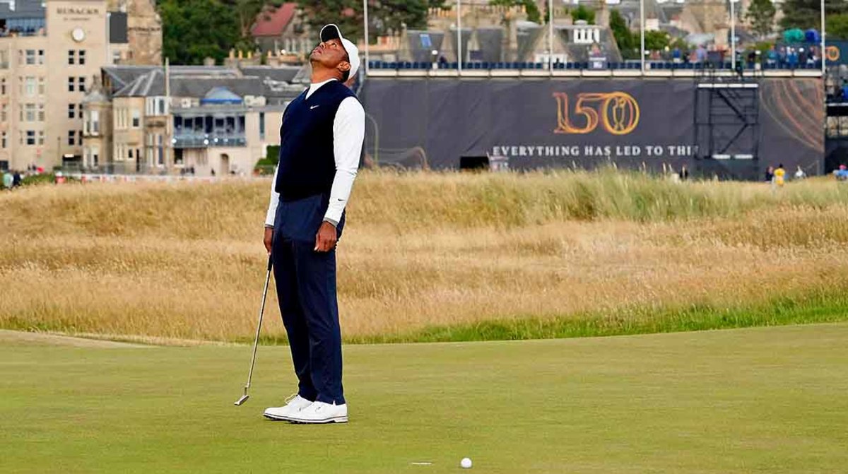 Tiger Woods looks skyward after missing a putt in the first round of the 2022 British Open.