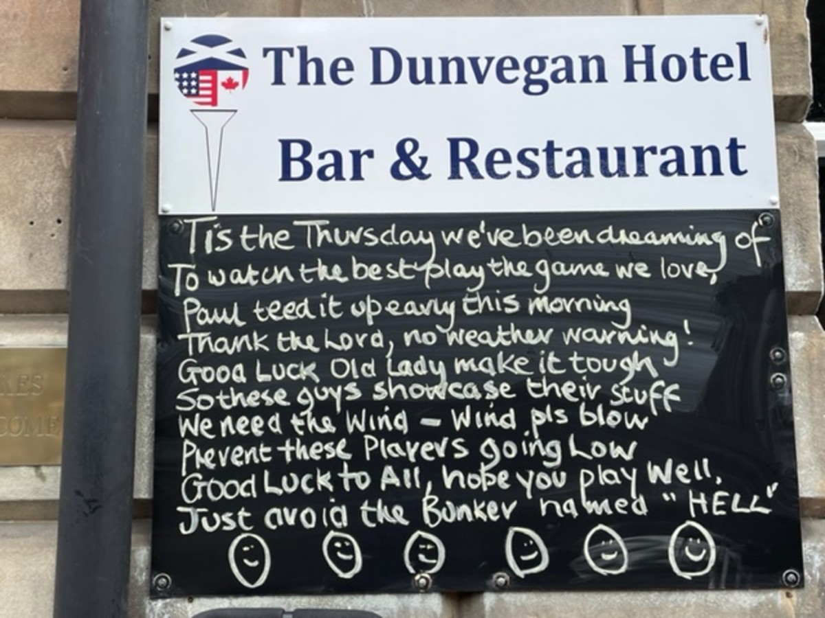 A poem is on a sign at the Dunvegan Hotel Bar and Restaurant in St. Andrews, Scotland.