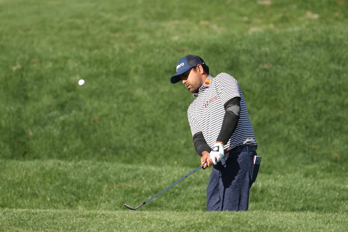 Anirban Lahiri chips during the 2022 Players Championship.