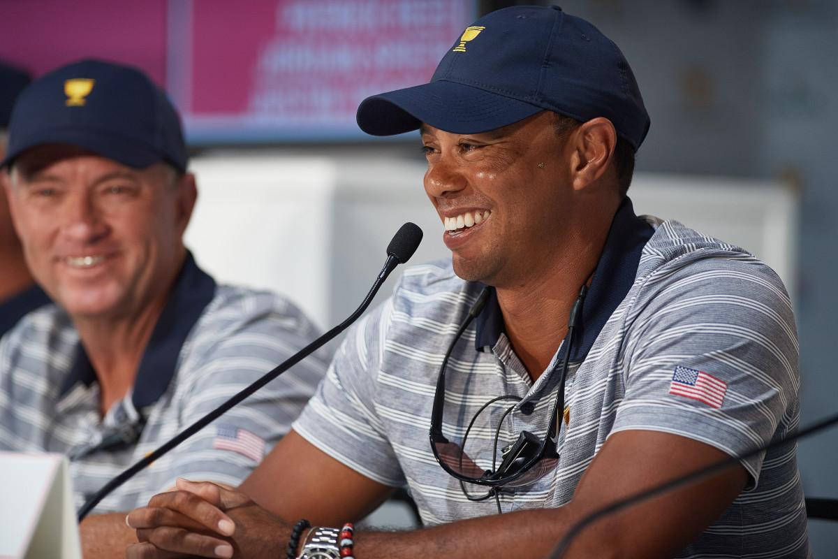 Captain's Assistants Tiger Woods and Davis Love III of the American Team are interviewed after practice rounds prior to the Presidents Cup at Liberty National Golf Club on September 27, 2017 in Jersey City, New Jersey.