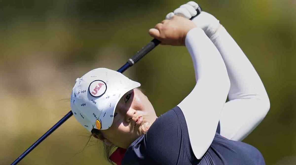 United States' Angel Yin plays her tee shot on the 4th hole during her single match at the Solheim Cup golf tournament at Finca Cortesin in Spain, Sunday, Sept. 24, 2023.