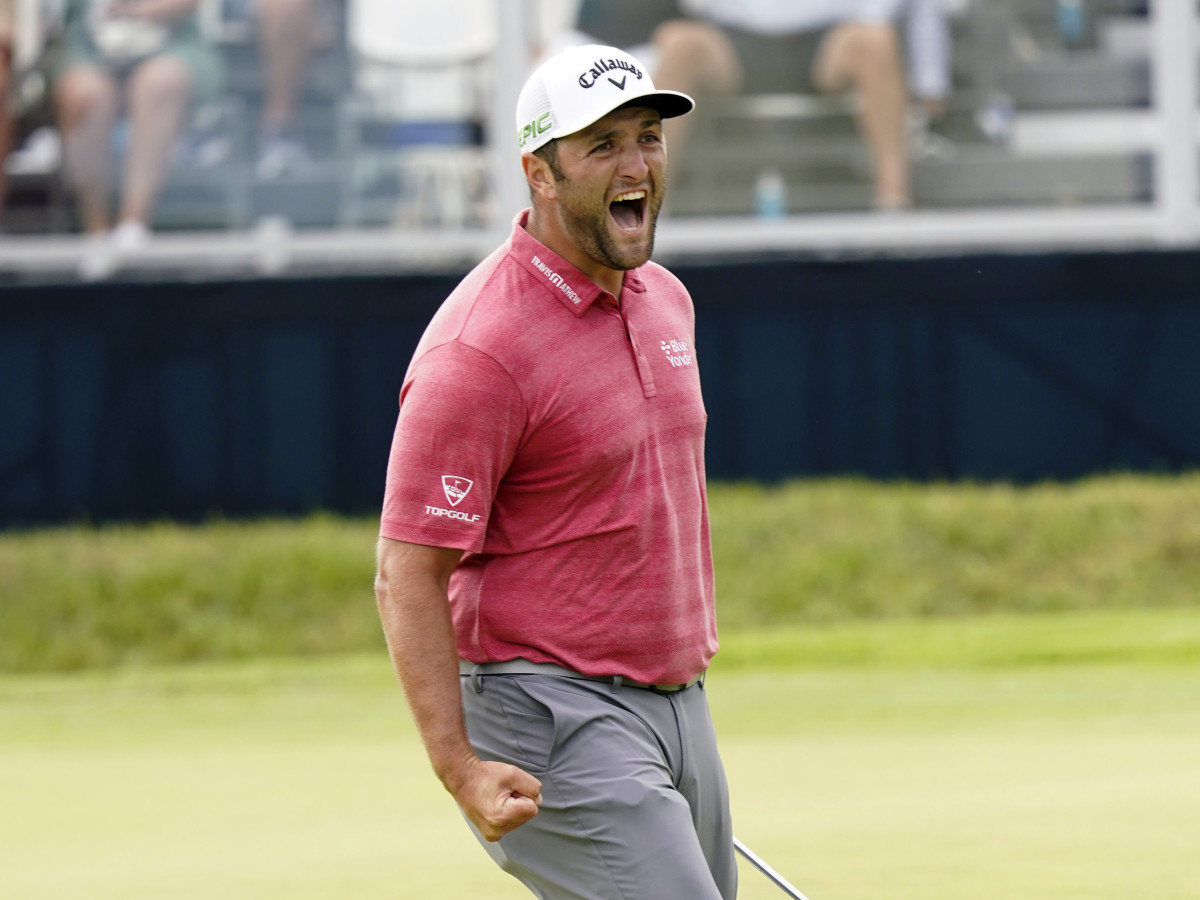 Jon Rahm reacts to his birdie putt on the 18th green during the final round of the U.S. Open golf tournament at Torrey Pines Golf Course.