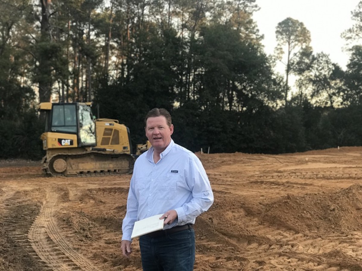 Kris Spence shown at work at the Quixote Club.