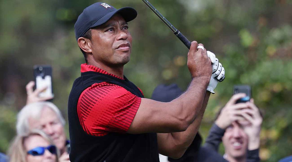 Tiger Woods watches a shot at the 2022 PNC Championship.