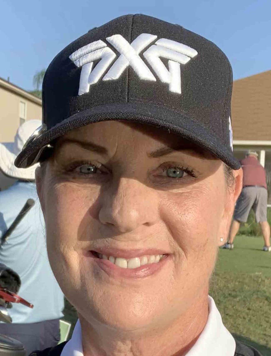 Patti Valero headshot with PXG golf hat