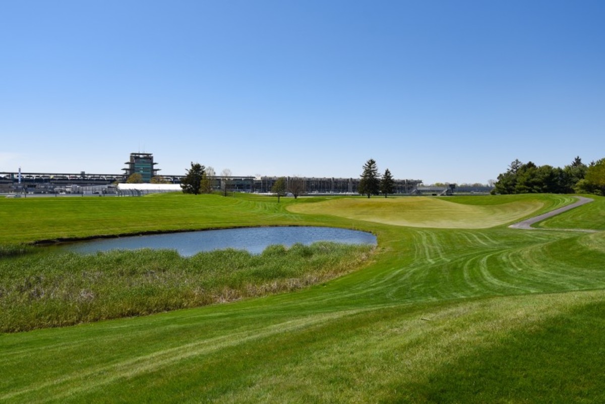 Teeing ground view of the par-3 seventh hole, which features views of the pagoda and backside of grandstands and suites along the track's front straightaway.