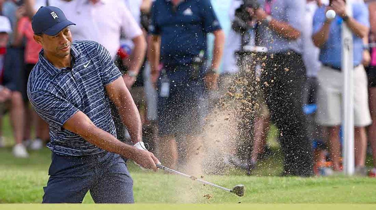 Tiger Woods hits from a bunker during the first round of the 2022 PGA Championship.