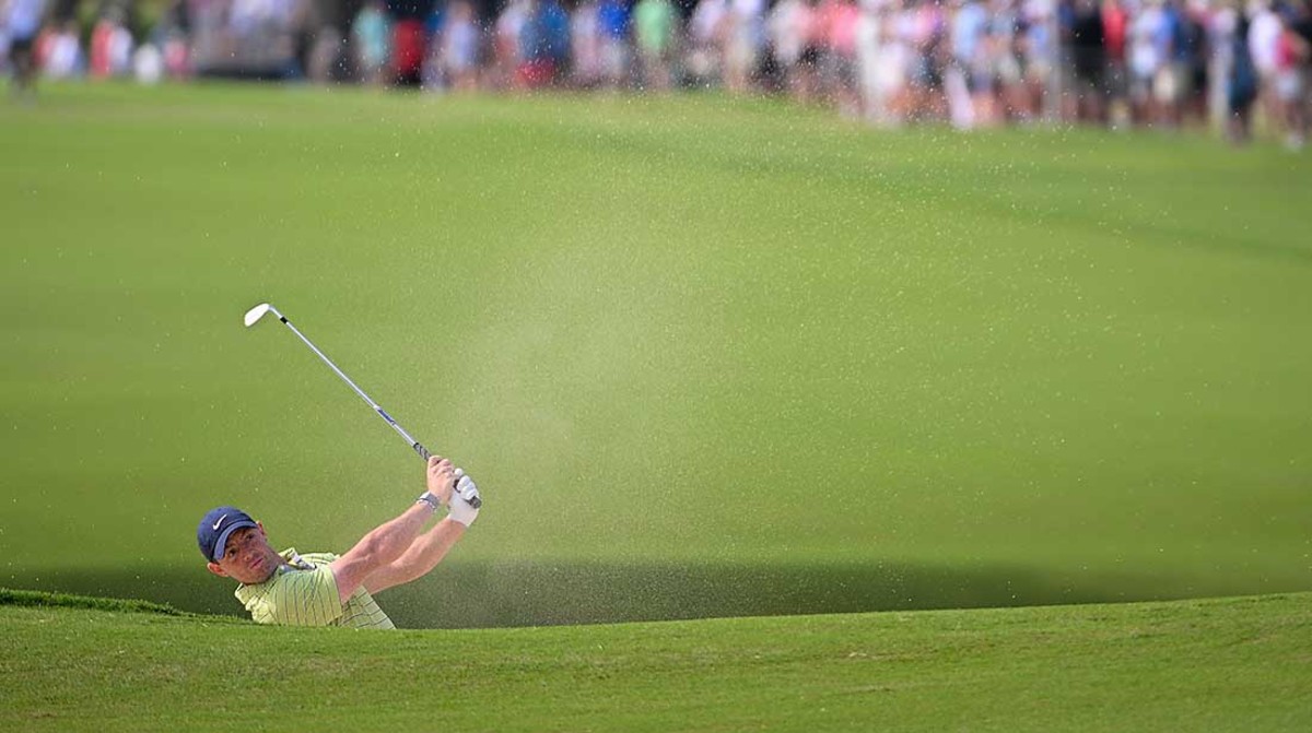 Rory McIlroy hits from a bunker shot in the first round at the 2022 PGA Championship.