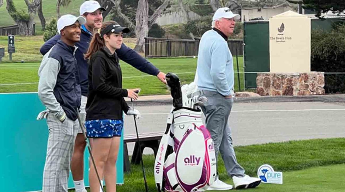PGA Tour Champions pro Mark O'Meara watches play alongside First Tee juniors.