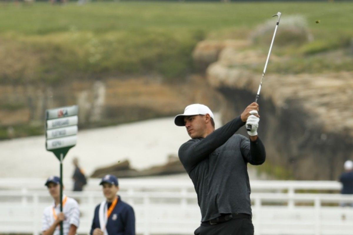 Brooks Koepka, practicing Wednesday on the 4th hole at Pebble Beach, stands on the verge of golf history this week.
