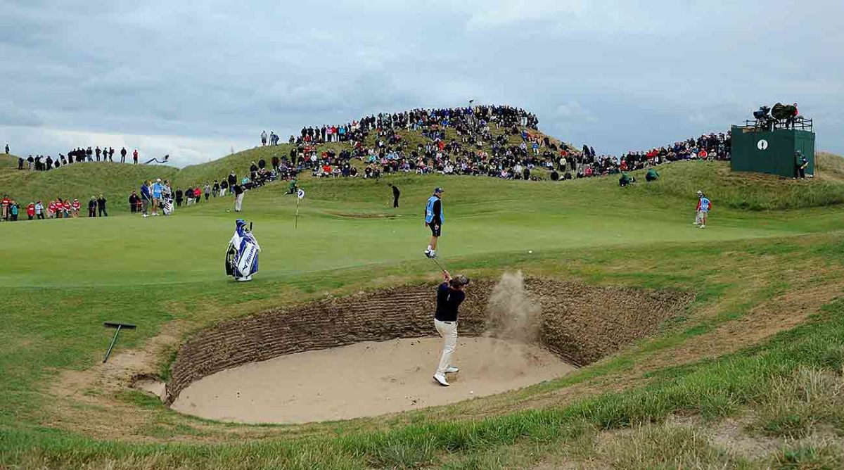 A general view of Luke Donald practicing bunker shots on the sixth green during a practice day for the 2011 Open Championship at Royal St George's, Sandwich.