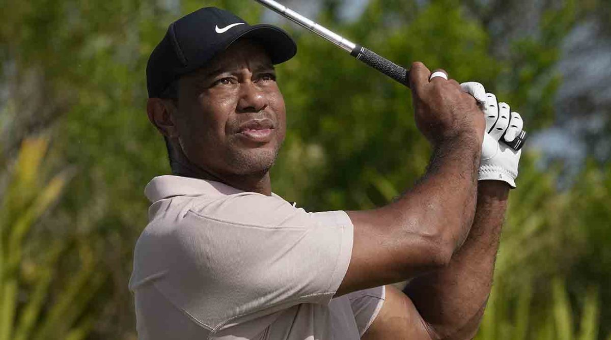 Tiger Woods watches his tee shot on the second tee during the first round of the Hero World Challenge at the Albany Golf Club, in New Providence, Bahamas, Thursday, Nov. 30, 2023.