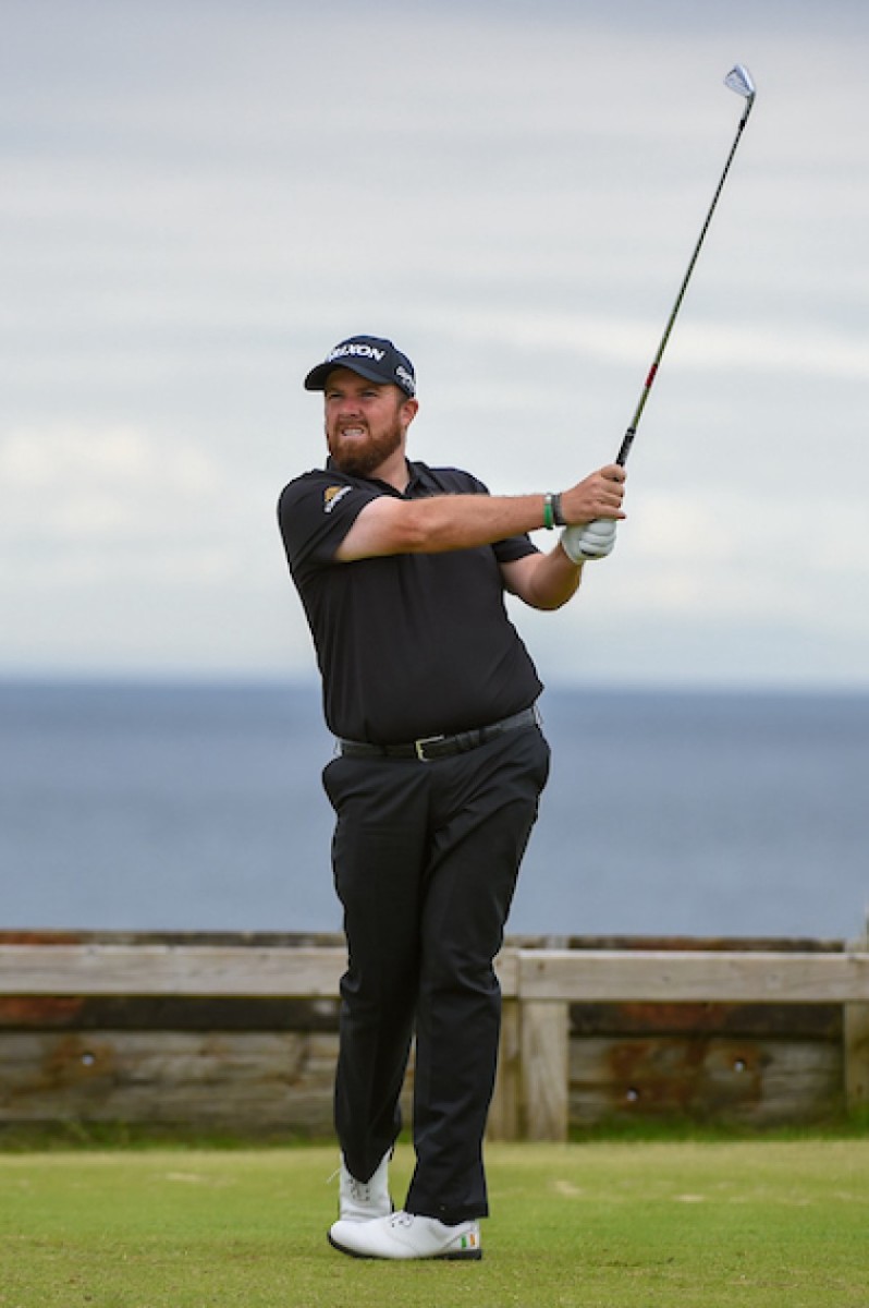 Shane Lowry, watching his tee shot on the 6th hole Friday at Royal Portrush, holds a share of the British Open lead.