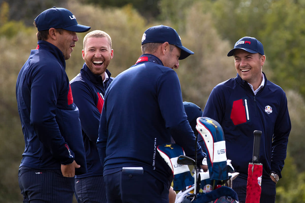 Brooks Koepka, Daniel Berger and Jordan Spieth laugh together Wednesday.