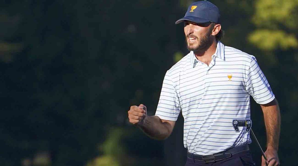 Max Homa celebrates after making a putt at the 2022 Presidents Cup.