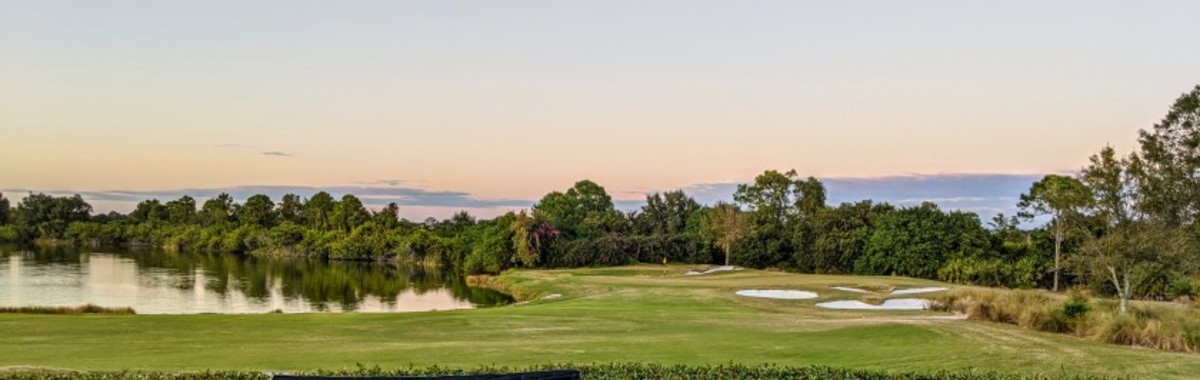 The Fox Club's 18th hole is a 586-yard par 5 that is made more difficult by the presence of water along the dogleg left into the green.