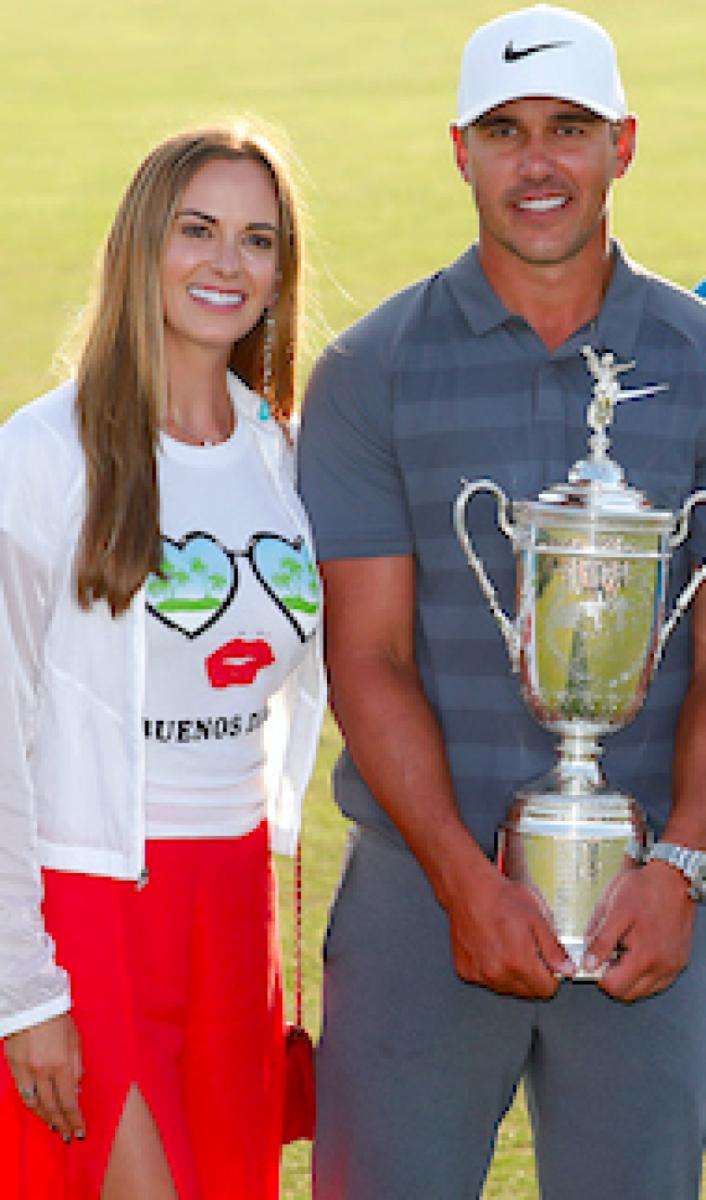 After a week on Long Island for the 2018 U.S. Open, Brooks Koepka leaves with the trophy and the girl.
