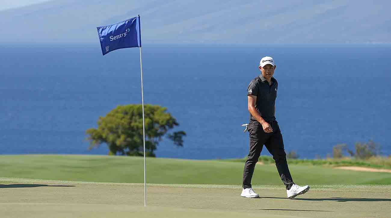 Collin Morikawa walks across the 13th green during the final round of the 2023 Sentry Tournament of Champions at Plantation Course at Kapalua Golf Club in Lahaina, Hawaii.