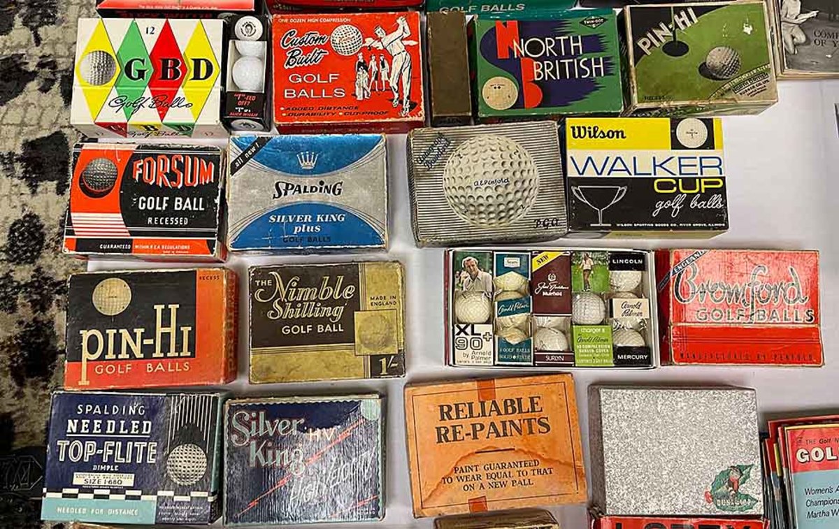 Vintage golf ball boxes are pictured at the 2022 Golf Heritage Society trade show.
