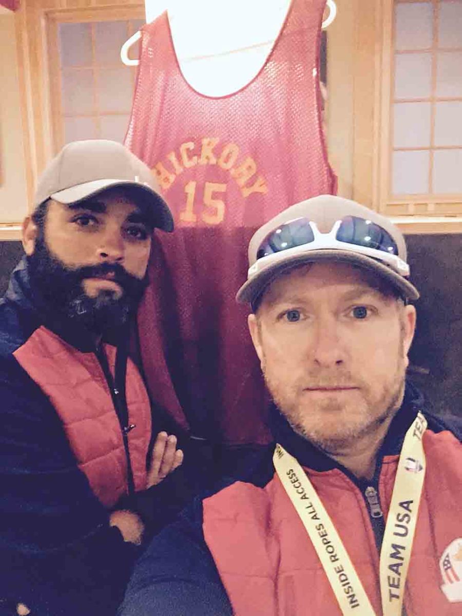2016 Ryder Cup caddies Michael Greller (left) and John Wood with a Hickory High basketball jersey based on the movie "Hoosiers."