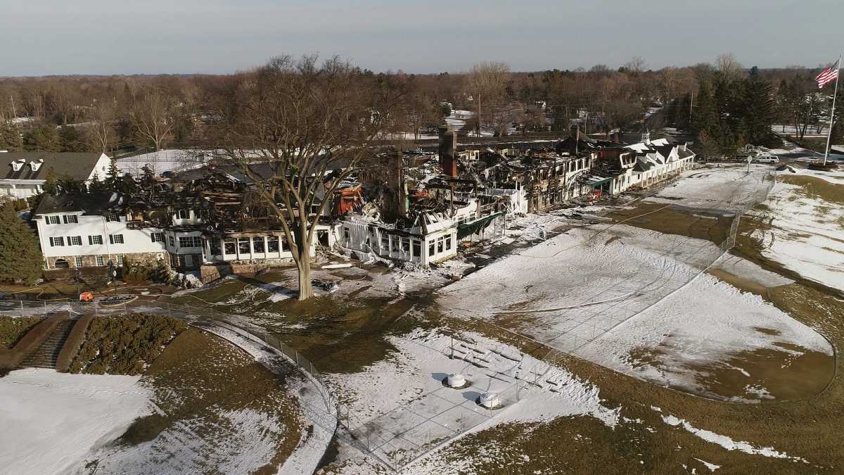 Oakland Hills Country Club's clubhouse was gutted in a February 2022 fire.