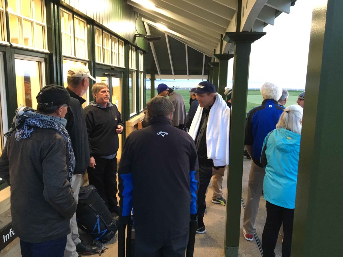 Golfers wait out single spots on The Old Course in St. Andrews, Scotland.