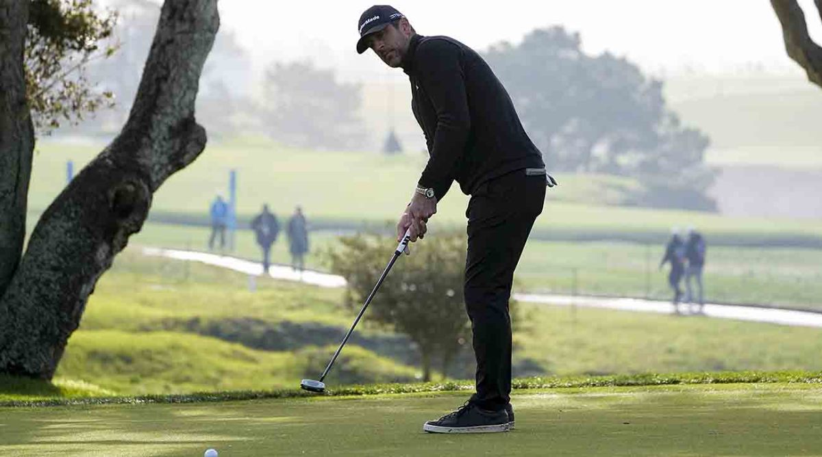 Aaron Rodgers watches a putt in the third round of the 2023 AT&T Pebble Beach Pro-Am.