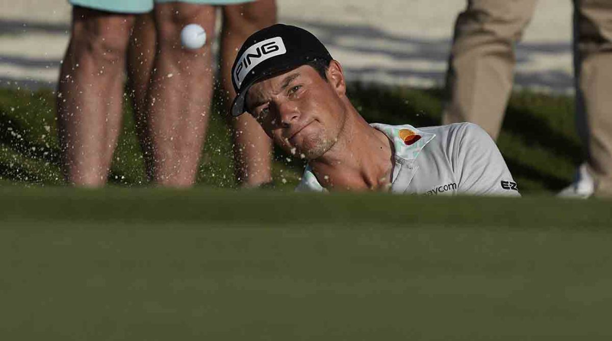 Viktor Hovland hits out of a bunker at the 2022 Hero World Challenge.
