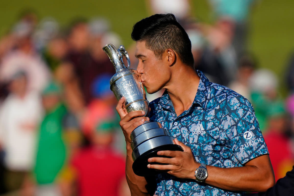 Collin Morikawa with the claret jug.