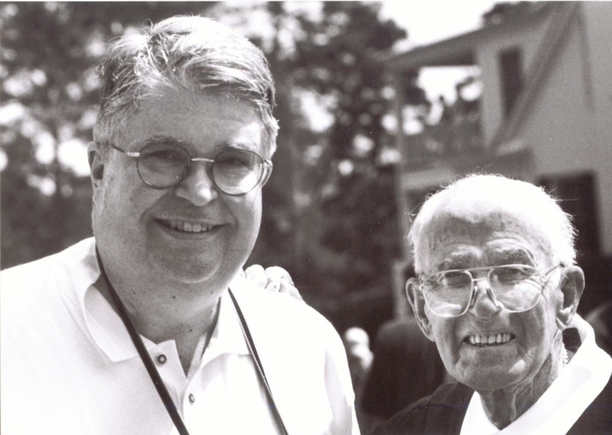 Author John Fischer (left) joins a 91-year-old Paul Runyan in 2000 during Masters week at Augusta National after the Par 3 Contest at Augusta National Golf Club.
