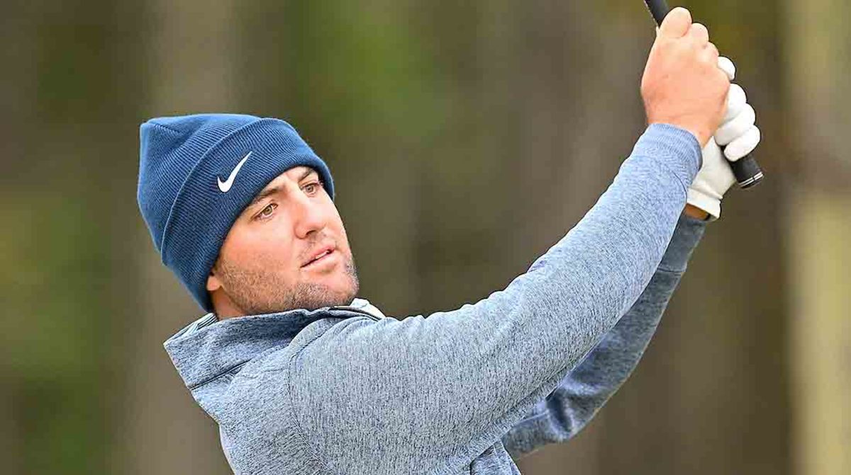 Scottie Scheffler hits a shot during practice for the 2022 Genesis Scottish Open.