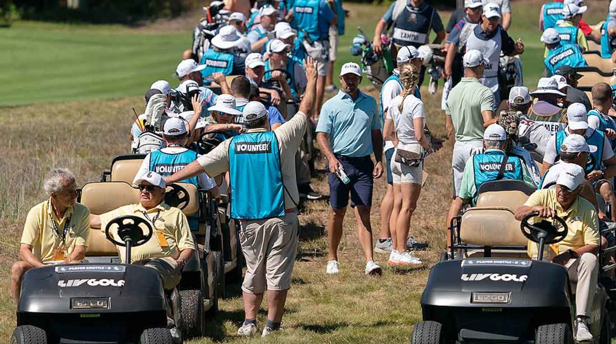 Golf carts are lined up ready to take players to their starting holes at the 2022 LIV Golf Invitational Boston.