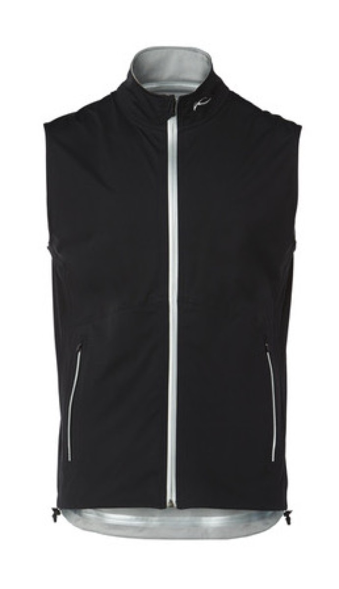 When this Kjus double-sided vest has the dark side facing outward the water- and wind-proof fabric absorbs 99 percent of all external ambient heat and pushes it inside. The temperature against the body can rise up to 10 degrees. Flipped light-side out, the fabric can reduce the temperature by about the same amount.  