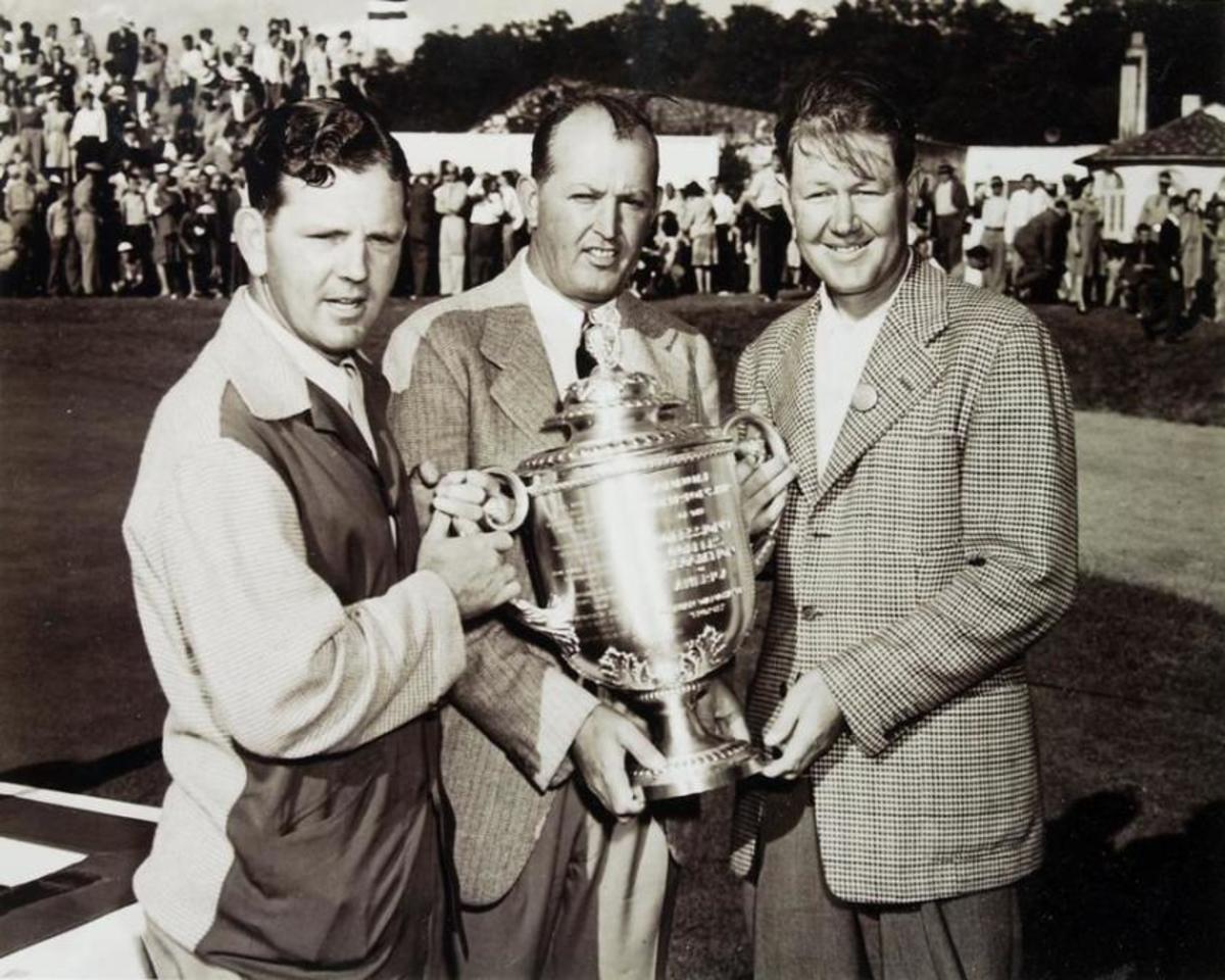 At the 1945 PGA Championship, runner-up Sammy Byrd (from left) poses with PGA president Ed Dudley and winner Byron Nelson.